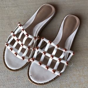 Free People white slides with rose gold studs